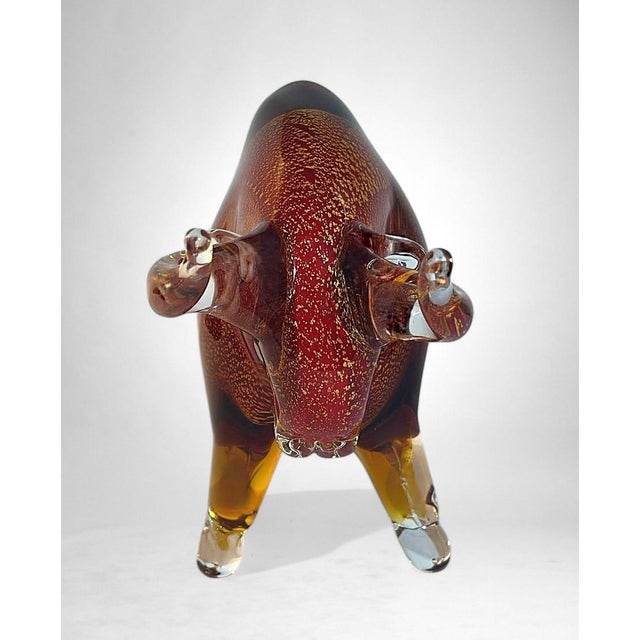 Magnificent Murano glass sculpture depicting a bull, entirely handcrafted using the renowned “sommerso” technique. This...