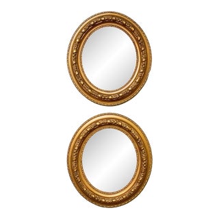 Pair of Antique Victorian Gilded Oval Mirrors in Wood Gesso Frames For Sale