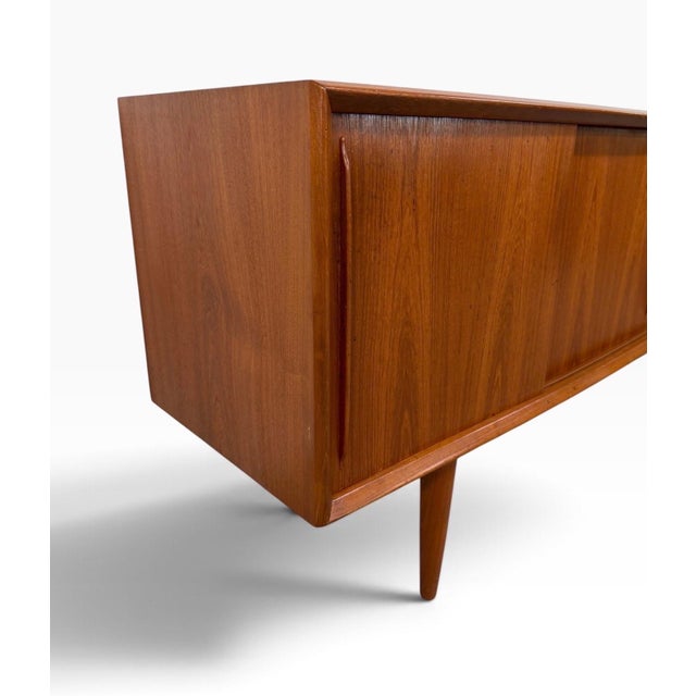 Exceptional Vintage H.P. Hansen Danish Modern Teak Sideboard, circa 1970s. Crafted in Denmark, this impressive piece...