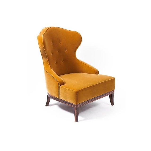 Candy armchair by munna dimensions: d 83 x w 73 x h 99 cm. Sh: 44 cm. Materials: ebony wood, foam, brass, and upholstery....