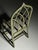 Bamboo armchair. Presumably from England, circa 1980. This chair is olive green in color. Dimensions: 114H x 53W x 56D cm...