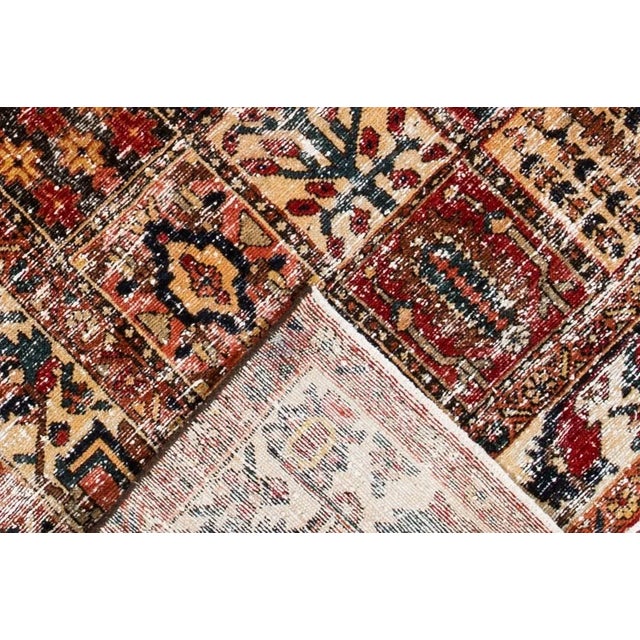 Beautiful vintage Persian hand-knotted wool rug with a multi-color field. This piece has a gorgeous all-over geometric...