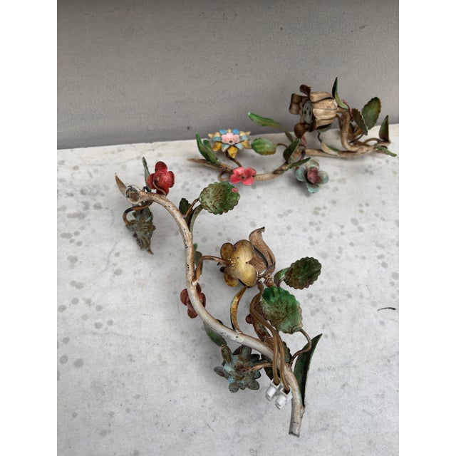 French Small Pair of Wrought Iron Flowers Sconces. H / 10 inches. W / 4.5 inches. D / 4 inches.