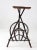 This is an antique Adirondack twig table. Crafted from willow branches, the rustic black table features a bentwood...