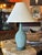 Classic, vintage MCM table lamp in soft green, pebbled texture. There is a band of darker green at the bottom and top of...