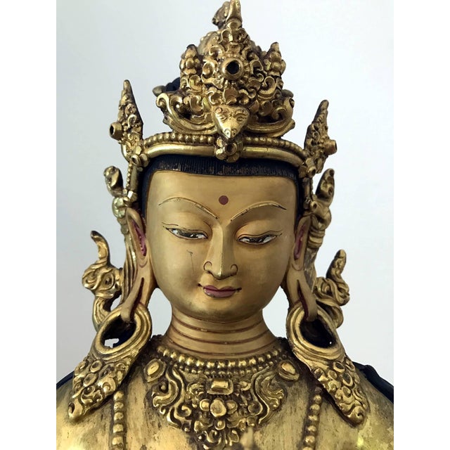 On offer is an impressively large and finely cast Sino-Tibetan gilt antiquebronze statue of Vajrasattva Bodhisattva, circa...