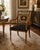 An elegant Italian Neoclassical armchair by Galimberti Lino, crafted in Italy and distinguished by its refined hand-...