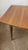 Classic mid-century walnut dining table with rosewood inlay designed by Stanley furniture circa 1960s. Features refinished...