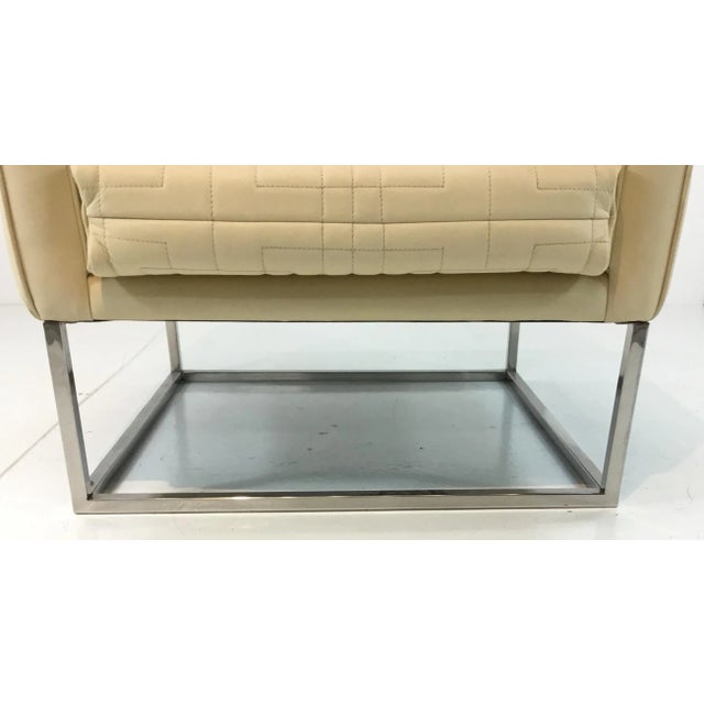 Stylish Modern Quilted Ivory Leather Tuxedo Chair, chrome base, showroom floor sample, original retail $2550