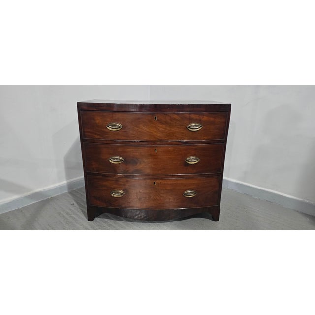 Very nice small proportioned Georgian bow front three drawer chest, ebony stringing, brass handles, solid sides, in very...