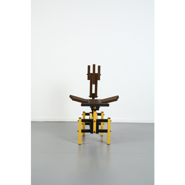 Painted aluminum chair, enameled steel rods, plastic hole covers. One-of-a-kind. This piece has an attribution mark, I am...