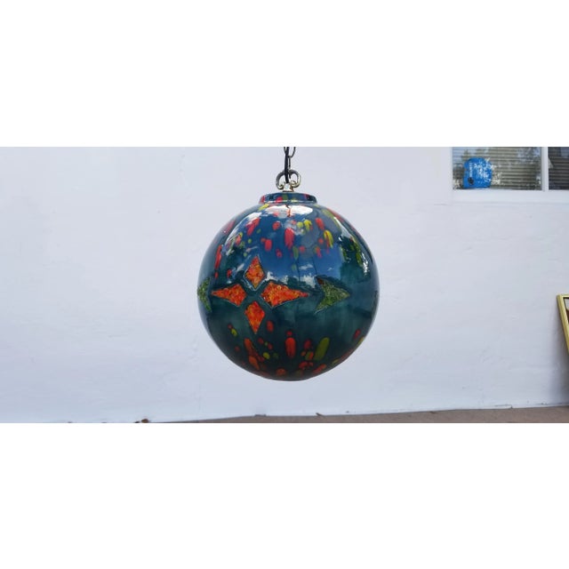 Mid-century modern ceramic glazed pendant lamp with beautiful colors of green, blue, red, orange, and yellow. No ceiling...