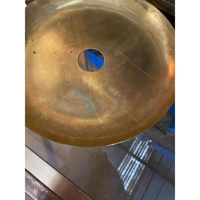 This is a beautiful brass serving/decorative tray with an opening in the middle for a candle or other centerpiece. This...