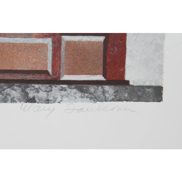 Rendered in hues of brown and red, this storefront image of a gallery library by Mary Faulconer is exemplary of the...