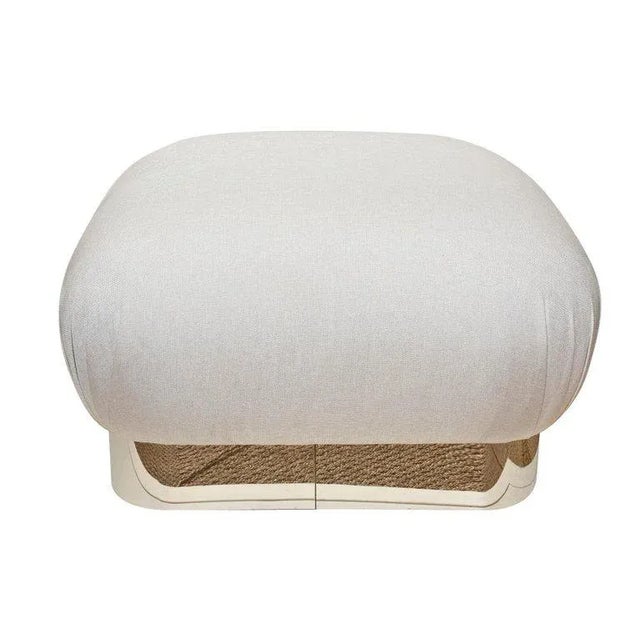 This ultra chic and large vintage Karl Springer large souffle pouf or ottoman has been newly re-upholstered and the brass...