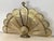 Vintage brass peacock fireplace screen with shell motif. Folds up for easy storage. Please see condition details noted....