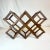 Great fold up wood wine rack that looks great on a counter top. It has a carved design in the wood and holds up to 10...