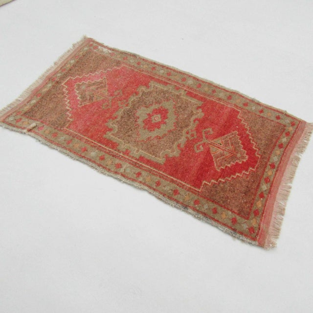 Vintage handknotted decorative mini rug from Konya region of Turkey. Approximately 50-60 years old. In very good condition.