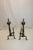 Very charming pair of brass andirons from the 19th century with the original patina, decorative and timeless. Dimensions:...