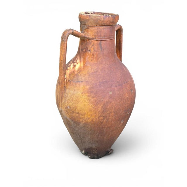 Impressive monumental terracotta jar crafted in Italy during the 1950s, featuring a beautiful glazed finish and elegant...
