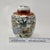 Add a touch of timeless elegance to your space with this beautiful vintage porcelain ginger jar. Featuring a stunning...