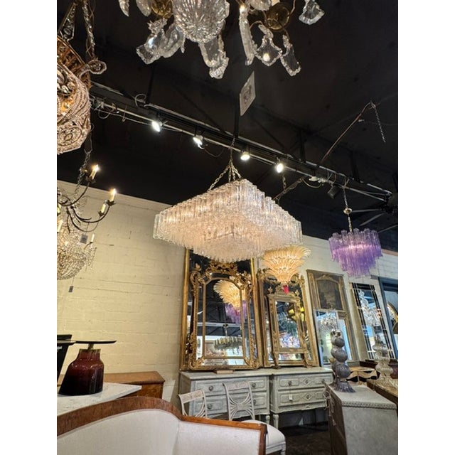 The Vintage Italian Large Scale Murano Tronchi Glass Chandelier is a stunning and elegant lighting fixture that exudes...