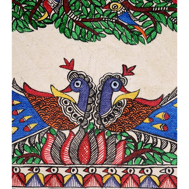 Celebrate the rich heritage of Indian folk art with this exquisite hand-painted Madhubani painting by Mamta Devi, a...