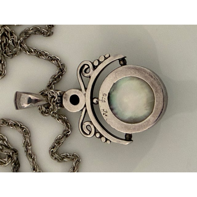 Vintage 925 Sterling Silver Pendant Necklace Featuring a Large Iridescent Pearl and a Smaller Gemstone For Sale - Image 4 of 6