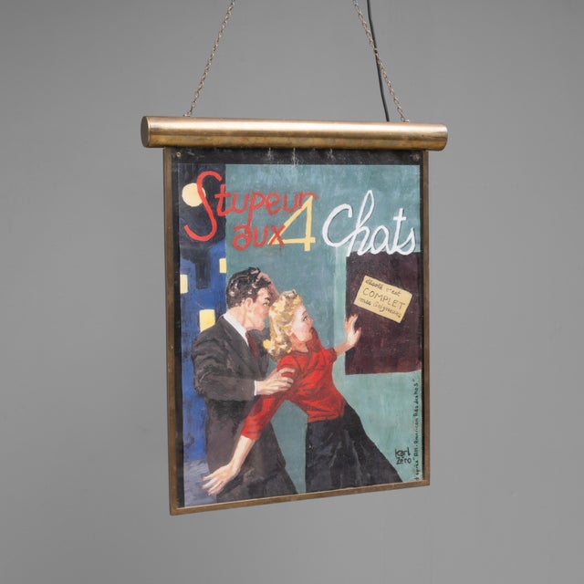 Early 20th century illuminated advertising sign. On original chain with brass surround re-wired. Containing a 1970s Carl...