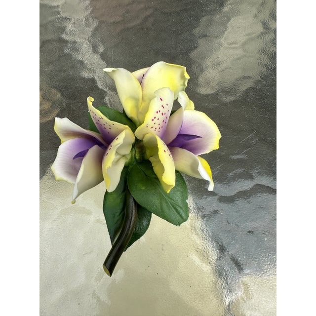 Up for consideration is a beautiful petite ceramic flower. This would look lovely on display in your home and it is a...