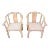 Asian Rattan Horseshoe-Back Armchairs, a Pair For Sale