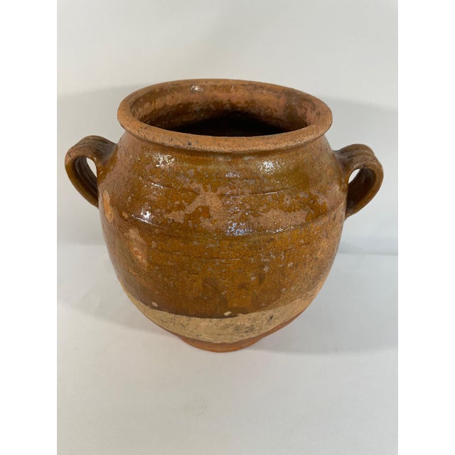 A wonderful French drip glazed Earthenware Confit Pot or Jar from the Southwest part of France. Circa 19th Century. This...