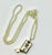 1990s Vintage Chippendale Art Deco Nutcracker Babble on Faux Pearls Christmas Pendant Necklace, 40” For Sale - Image 12 of 17