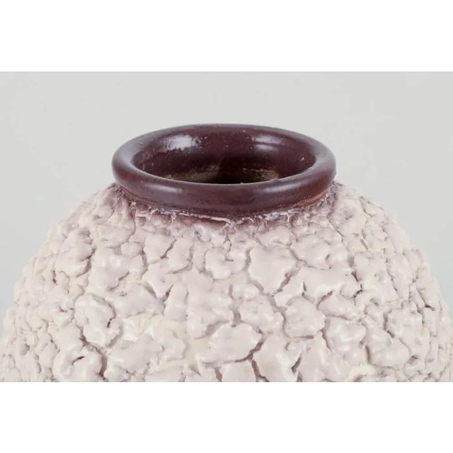 French ceramicist. Ceramic vase. Lava glaze in light and brown colours. Dating: Ca. 1960s Unsigned. In excellent...