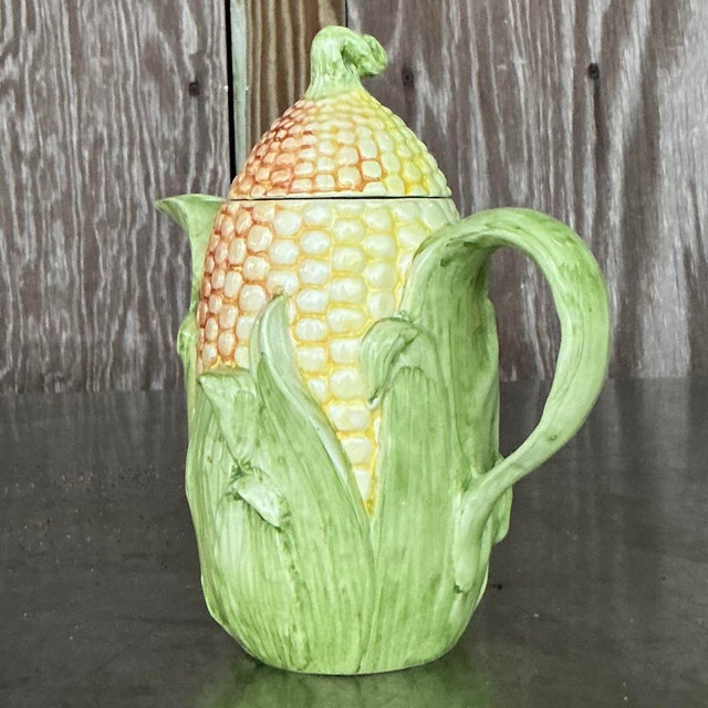 Add a touch of whimsical charm to your kitchen with this Vintage Italian Corn Cob Teapot. Expertly crafted to resemble a...