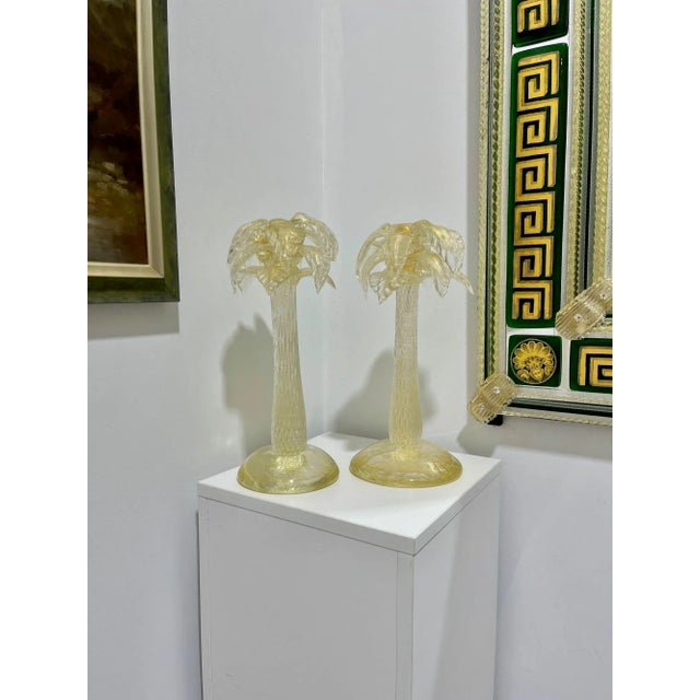 These lovely candle holders are made with 24K gold dust infused into the glass. They appear to be from Murano but there is...