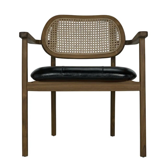 The Tolka chair features natural teak that forms into a circular structure complimented with a black leather seat for full...