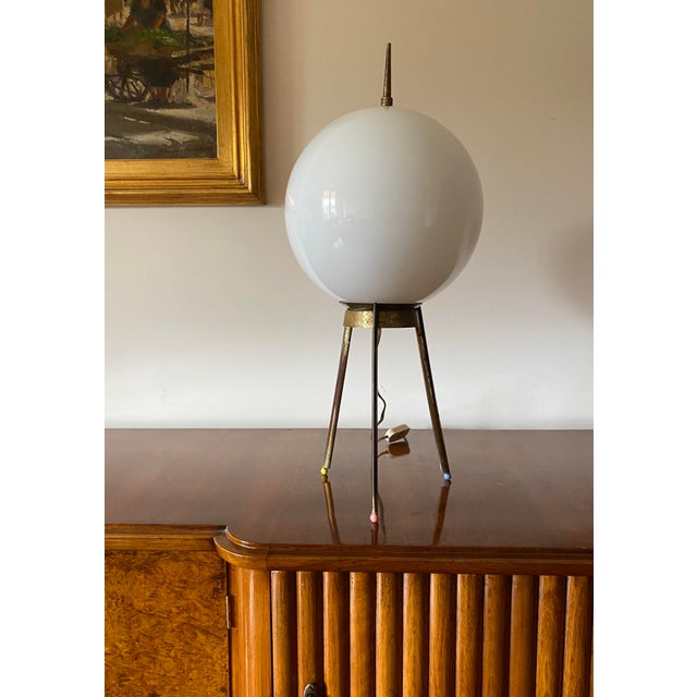 Mid-Century tripod brass table lamp Produced by Lumi, Italy, 1950s white opaline spherical glass H 58 cm x Diam. 26 cm...
