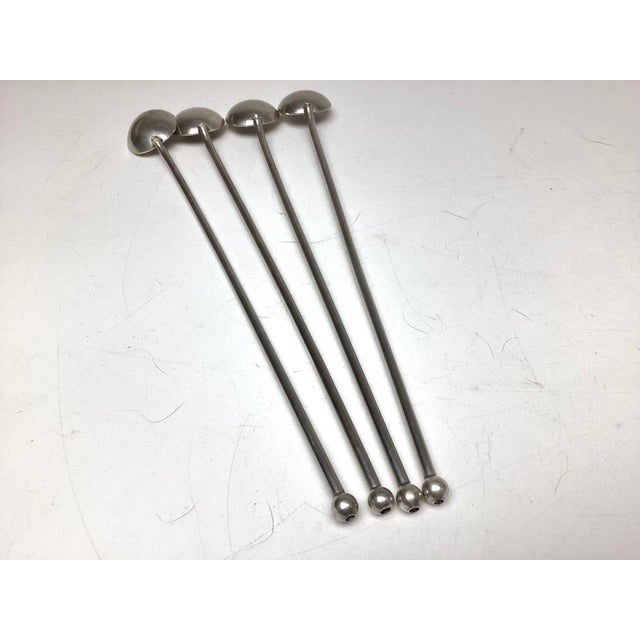 Sterling Silver Highball or Iced Tea Stirring Straws — Set of 4, each beautifully crafted with a oval shaped bowl and...