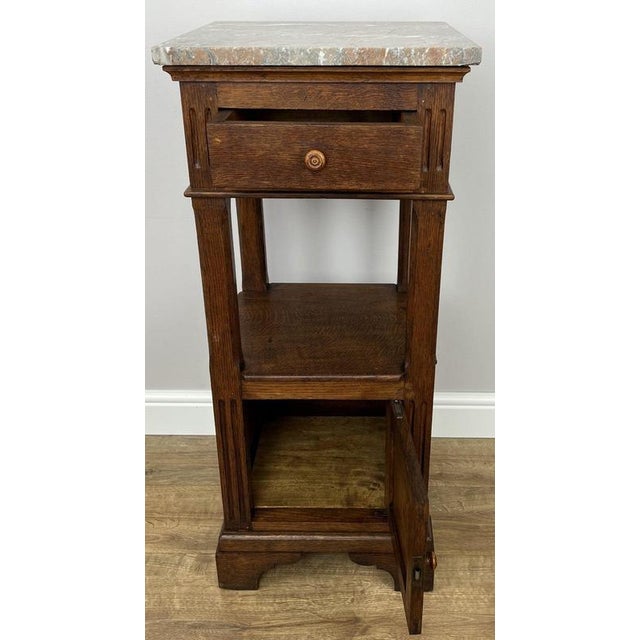 Add timeless French elegance to your home with this Antique French oak bedside cabinet , beautifully topped with a...