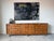 Bring timeless Mid Century Modern style to your home with this impressive Thomasville Tamerlane bar credenza. This long...