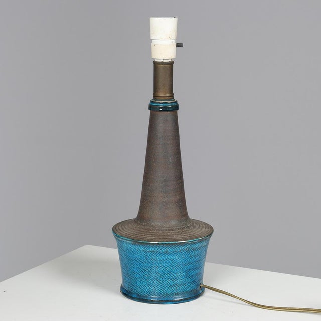Partially glazed table lamp by Nils Kähler (1906-1979) for Kähler, Denmark. Tagged at the bottom. Good overall condition,...
