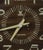 Mid-Century Wall Clock inMetal and plastic, with wood-veneer dial. Battery-operated quartz movement Circular chrome-toned...