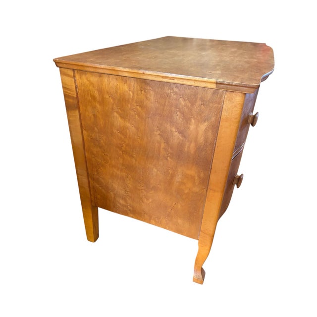 This 2 drawer Birdseye Maple dresser is a handmade antique piece from the early 1900s, with a Victorian style. The dresser...