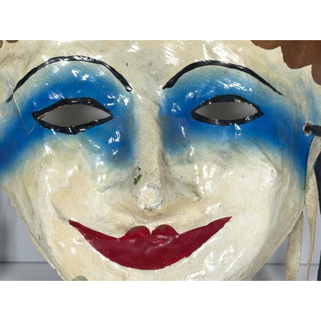 Vintage Hand Painted Papier Mache Jester Mask for your consideration. The mask measures approx. 14 inches tall, 13 1/2...