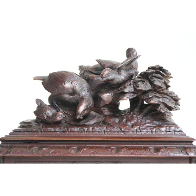 This stunning 19th-century Black Forest jewelry box from Switzerland is a true masterpiece. Nearly 150 years old, the wood...