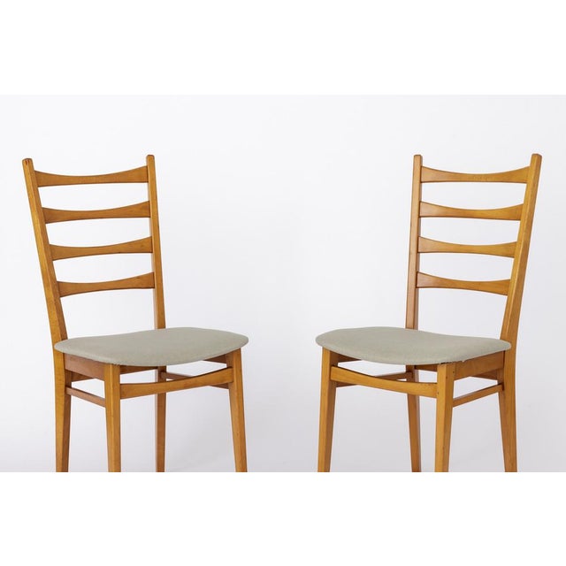 Pair of vintage dining chairs from the 1960s. German origin. Unknown manufacturer. Set of 2. Good vintage condition....