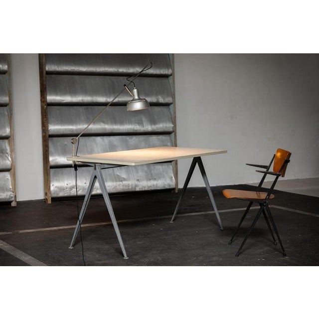 Large Pyramid table designed by Wim Rietveld and manufactured by Ahrend de Cirkel in the Netherlands 1959. This impressive...