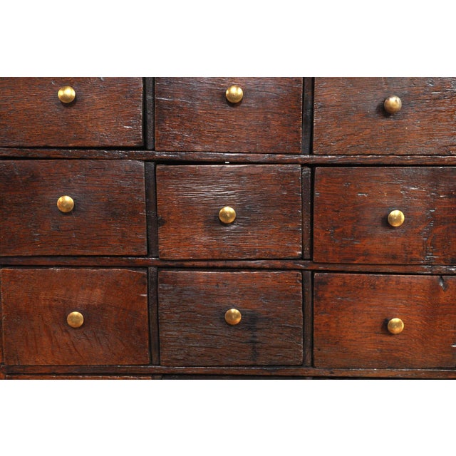 Beautiful antique chest of drawers, approximately 250 years old! all twelve drawers still have their original brass knobs....