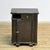 Bedside table from the 1930s with a characterful, industrial look. The cabinet features an elegant, curved front that...